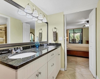 8776 Midnight Pass Road - Photo Thumbnail 14