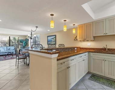 8776 Midnight Pass Road - Photo Thumbnail 7