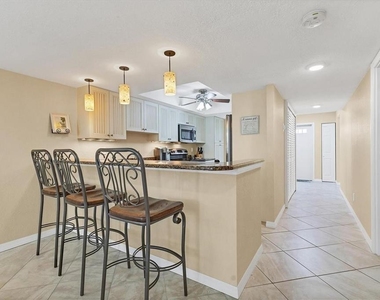 8776 Midnight Pass Road - Photo Thumbnail 4