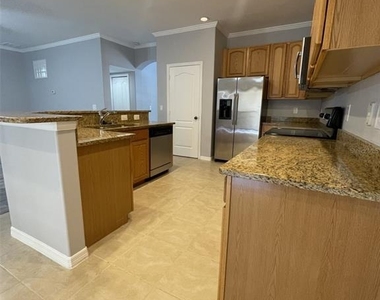 2827 Suncoast Lakes Boulevard - Photo Thumbnail 6
