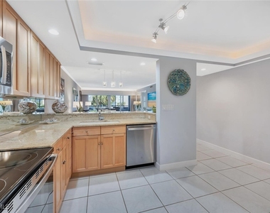 12945 Vanderbilt Drive - Photo Thumbnail 7