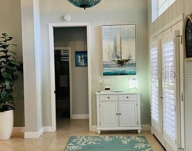 7236 Orchid Island Place - Photo Thumbnail 2