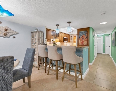 8776 Midnight Pass Road - Photo Thumbnail 8