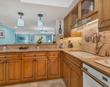 8776 Midnight Pass Road - Photo Thumbnail 9