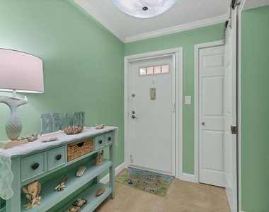 8776 Midnight Pass Road - Photo Thumbnail 4
