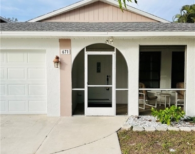 671 94th Avenue N - Photo Thumbnail 1