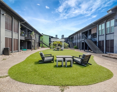 909 Reinli St - Photo Thumbnail 1