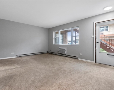 6256 W 64th Place - Photo Thumbnail 3