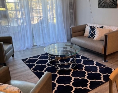 9070 Lime Bay Boulevard - Photo Thumbnail 7