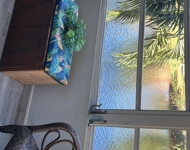 9070 Lime Bay Boulevard - Photo Thumbnail 1