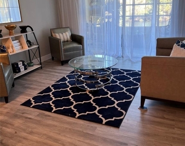 9070 Lime Bay Boulevard - Photo Thumbnail 4