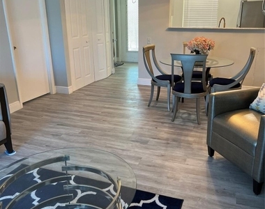 9070 Lime Bay Boulevard - Photo Thumbnail 2