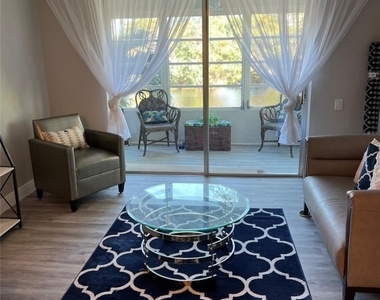 9070 Lime Bay Boulevard - Photo Thumbnail 9
