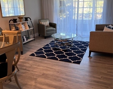 9070 Lime Bay Boulevard - Photo Thumbnail 3