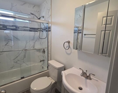 817 1/2 W 101st Street - Photo Thumbnail 4