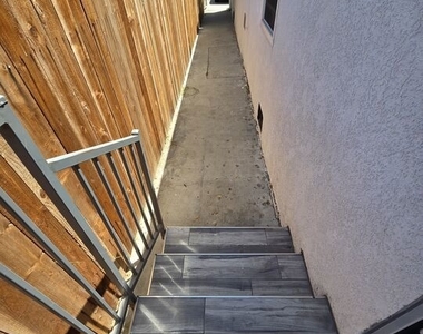 817 1/2 W 101st Street - Photo Thumbnail 1