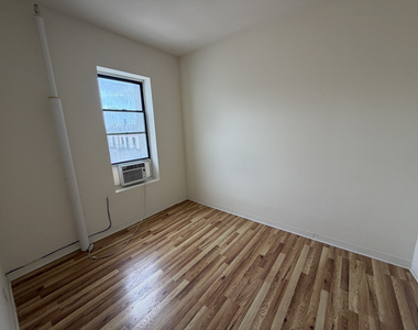 E 14th St - Photo Thumbnail 3