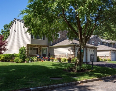 5000 Townhouse Drive - Photo Thumbnail 3