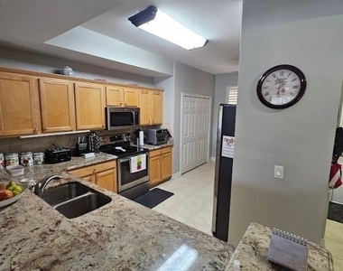10720 Ravenna Way - Photo Thumbnail 4