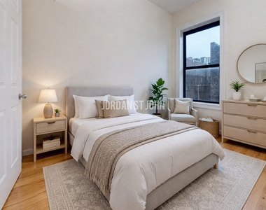 E 12TH ST - Photo Thumbnail 4