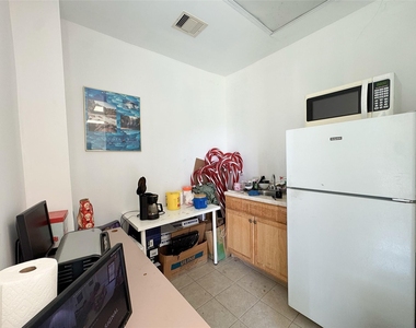 12317 Bellaire Boulevard - Photo Thumbnail 3