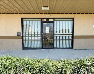 12317 Bellaire Boulevard - Photo Thumbnail 1