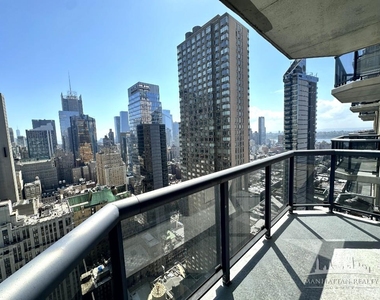 W 48th St and 8th ave - Photo Thumbnail 1