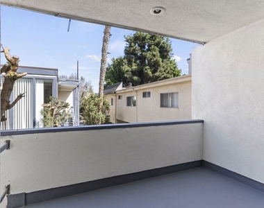 1233 Barry Avenue - Photo Thumbnail 5