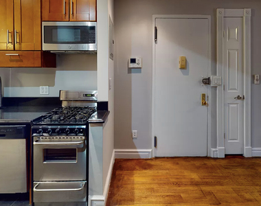 W 53rd St. - Photo Thumbnail 2
