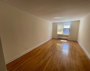 87-15 37th Avenue - Photo Thumbnail 5
