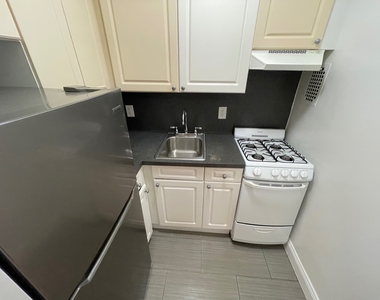 87-15 37th Avenue - Photo Thumbnail 1