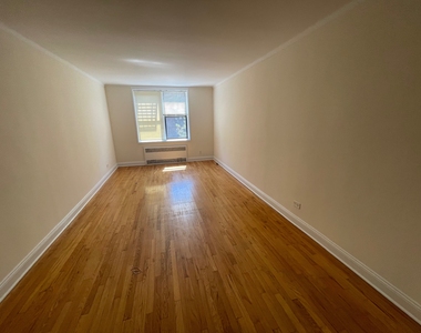 87-15 37th Avenue - Photo Thumbnail 7