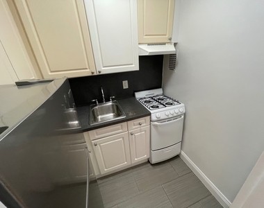 87-15 37th Avenue - Photo Thumbnail 4