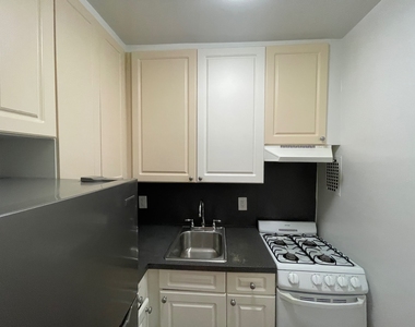87-15 37th Avenue - Photo Thumbnail 2