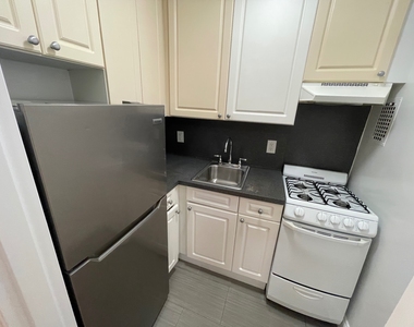 87-15 37th Avenue - Photo Thumbnail 3
