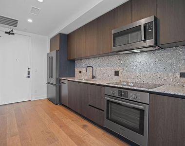 84 East Ave - Photo Thumbnail 2