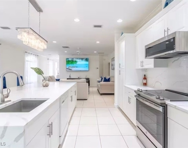 593 106th Avenue N - Photo Thumbnail 1