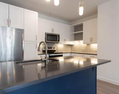 411 W Commerce St - Photo Thumbnail 6