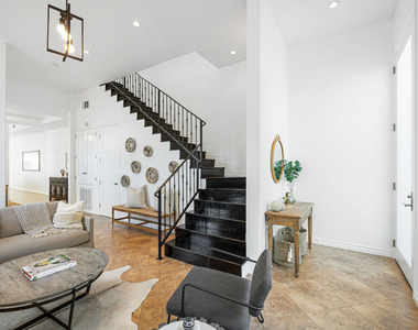 715 N Kilkea Drive - Photo Thumbnail 2