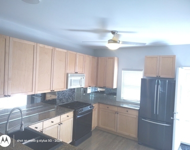2367 E 70th Place - Photo Thumbnail 3