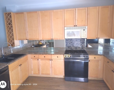 2367 E 70th Place - Photo Thumbnail 2