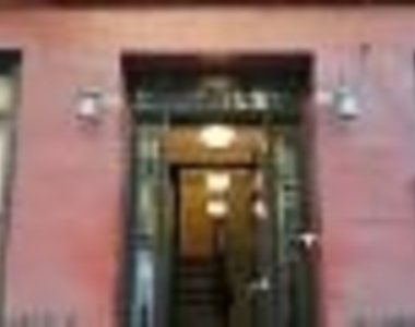 W 51st St - Photo Thumbnail 2