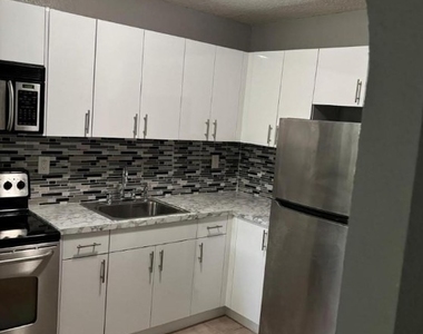 407 Se 3rd Avenue - Photo Thumbnail 1