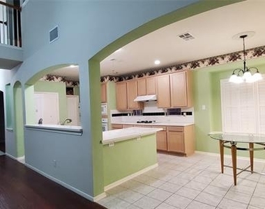 1003 Spring Tide Drive - Photo Thumbnail 2