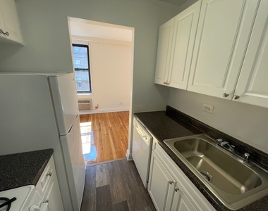 102-20 67th Drive - Photo Thumbnail 1
