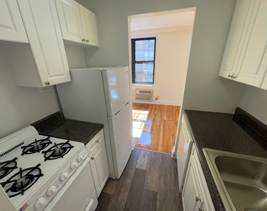 102-20 67th Drive - Photo Thumbnail 2
