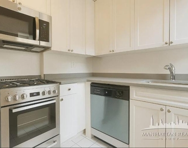 W 55th St - Photo Thumbnail 2