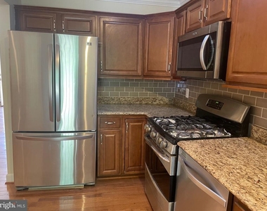 5102 Glassmanor Drive - Photo Thumbnail 1
