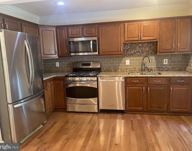 5102 Glassmanor Drive - Photo Thumbnail 2
