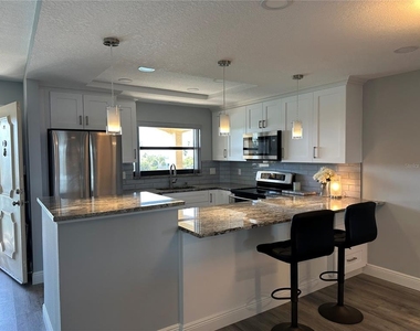 12500 Capri Cir N - Photo Thumbnail 1